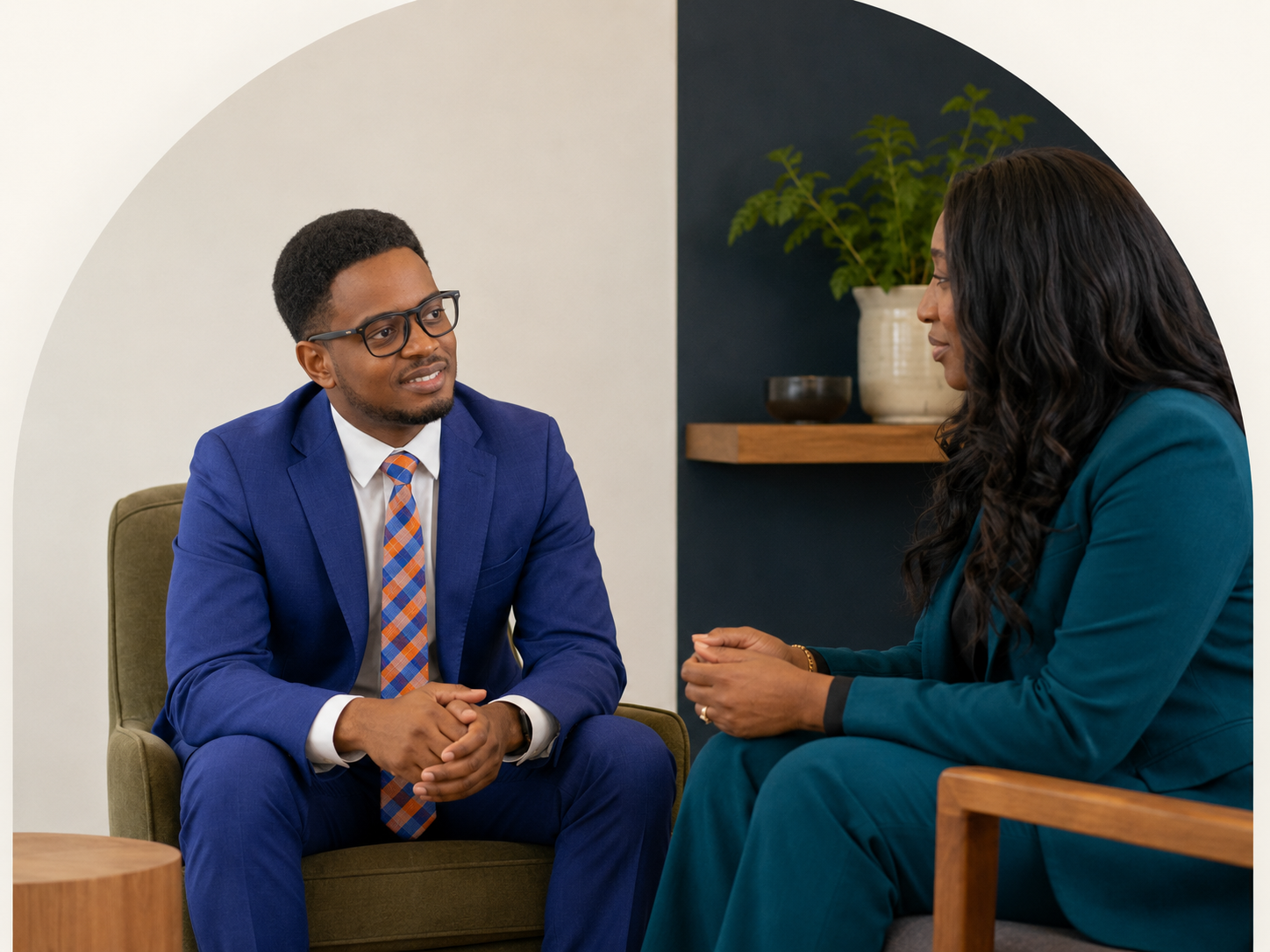Two professionals having a quiet, attentive workplace care conversation
